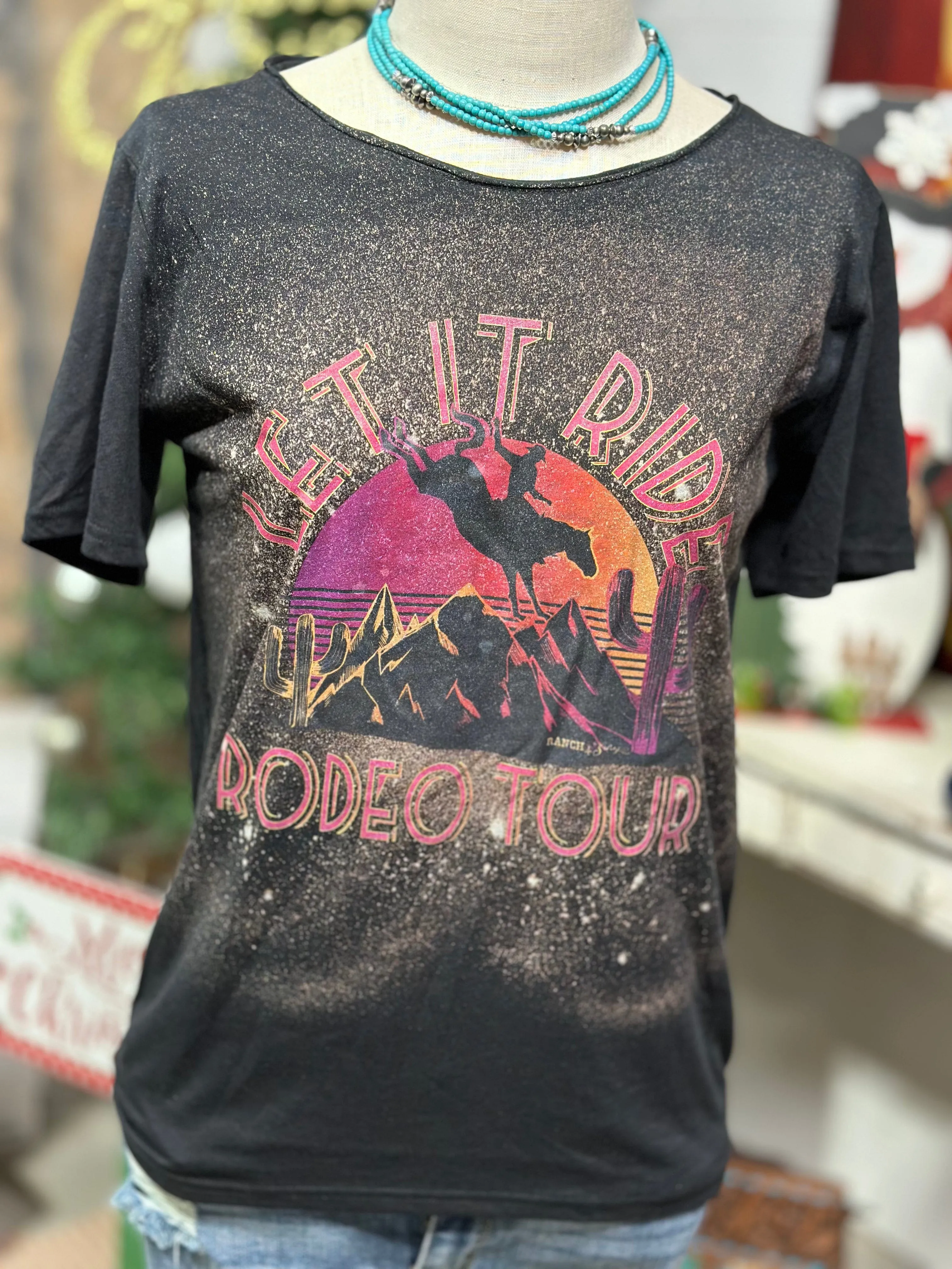 The Let It Ride Rodeo Tour Bleached Tee