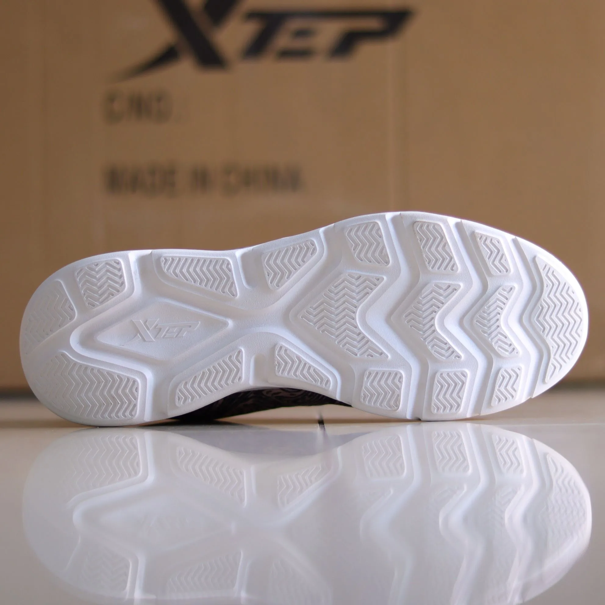 X31 - Women's Medicated Running Shoe by Xtep